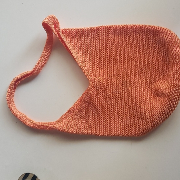 The Sak knit hobo bag in orange. - Picture 1 of 1